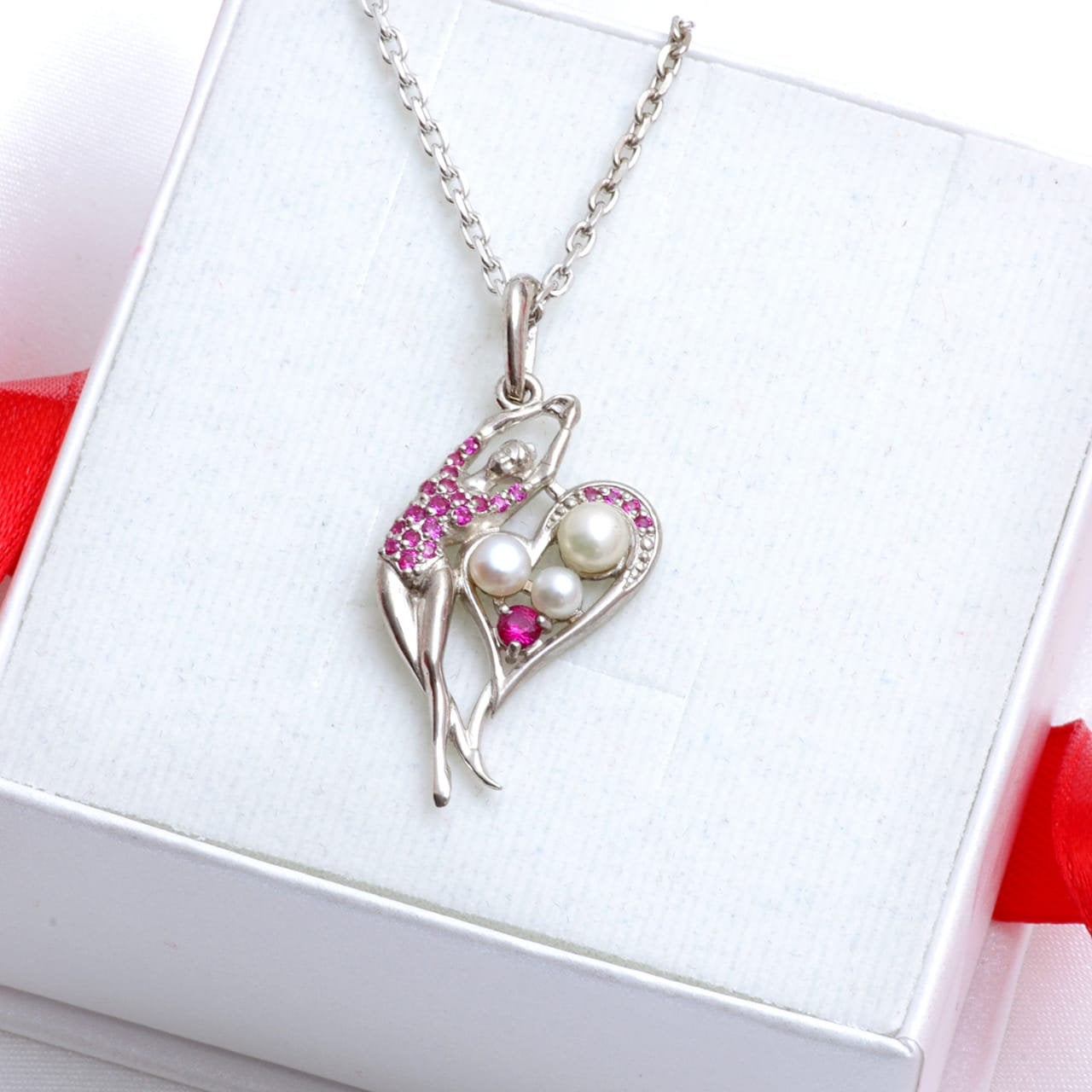 Pendentif en argent avec pierres précieuses "Champion"